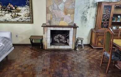 Imagem: A casa possui 3 Dormitórios, 3 Banheiros, 3 Vagas na garagem