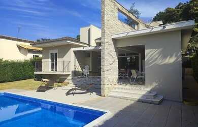 Imagem 2: CASA ASSOBRADADA EM CONDOMINIO COM 4 SUITES SENDO 1 CLOSET RESIDENCIAL...