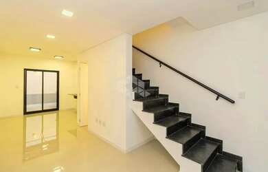 Imagem: A casa possui 2 Dormitórios, 3 Banheiros, 2 Vagas na garagem