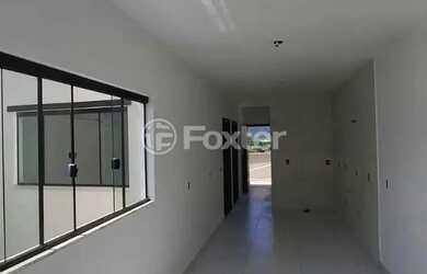 Imagem: A casa possui 2 Dormitórios, 1 Banheiro, 1 Vaga na garagem