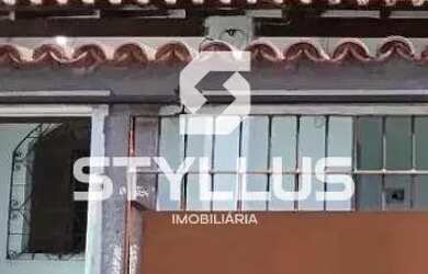 Imagem: A casa possui 3 Dormitórios, 2 Banheiros, 1 Vaga na garagem