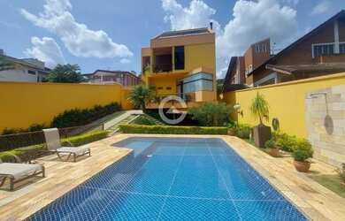 Imagem: A casa em condomínio à venda possui 4 Dormitórios, 5 Banheiros