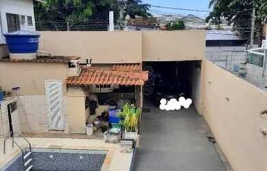 Imagem: A casa possui 5 Dormitórios, 5 Banheiros, 4 Vagas na garagem