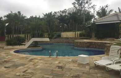 Imagem: A casa em condomínio possui 5 Dormitórios, 5 Banheiros, 5