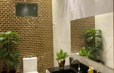 Imagem: A casa possui 3 Dormitórios, 4 Banheiros, 5 Vagas na garagem