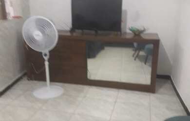 Imagem: A casa possui 3 Dormitórios, Churrasqueira, Varanda e está