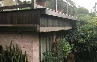 Imagem: A casa em condomínio possui 4 Dormitórios, 4 Banheiros, 4