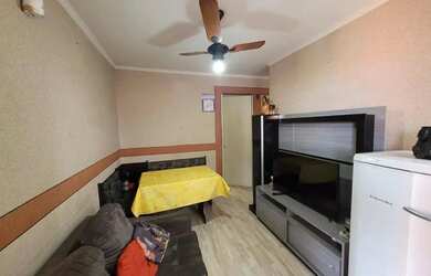 Imagem: O apartamento possui 2 Dormitórios, 1 Banheiro, 1 Vaga na garagem