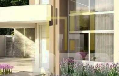 Imagem: A casa possui 3 Dormitórios, 4 Banheiros, 2 Vagas na garagem