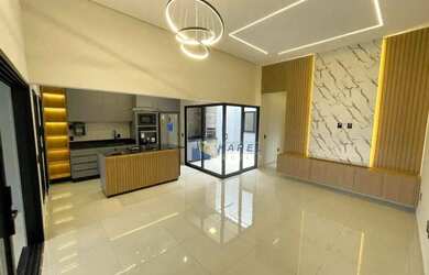 Imagem: A casa possui 3 Dormitórios, 2 Banheiros, 2 Vagas na garagem