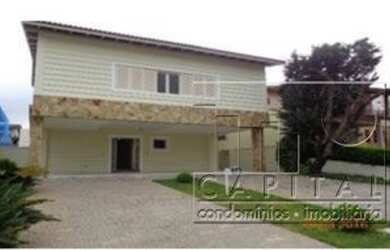 Imagem: A casa em condomínio possui 4 Dormitórios, 4 Banheiros, 2