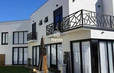 Imagem: A casa em condomínio à venda possui 4 Dormitórios, 4 Banheiros