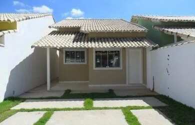 Imagem: A casa possui 3 Dormitórios, 2 Banheiros, 2 Vagas na garagem