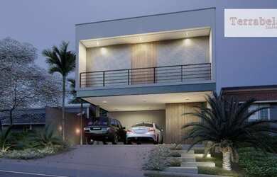 Imagem: A casa possui 3 Dormitórios, 4 Banheiros, 2 Vagas na garagem