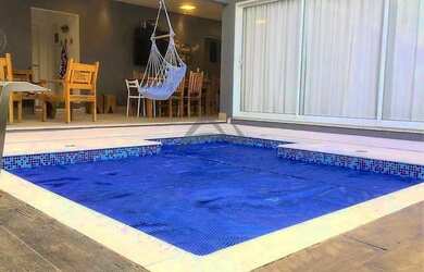 Imagem: A casa em condomínio possui 4 Dormitórios, 5 Banheiros, 2