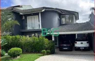 Imagem: A casa em condomínio e possui Dormitórios, Suítes, Banheiros