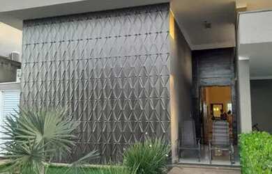 Imagem: A casa em condomínio possui 4 Dormitórios, 5 Banheiros, 450m²