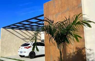 Imagem: A casa possui 3 Dormitórios, 3 Banheiros, 2 Vagas na garagem