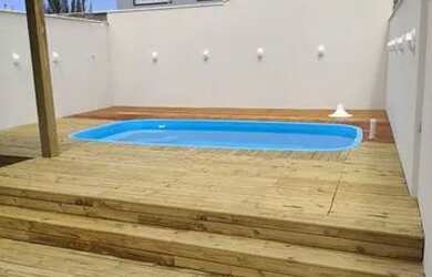 Imagem: A casa possui 3 Dormitórios, 4 Vagas na garagem e está localizado