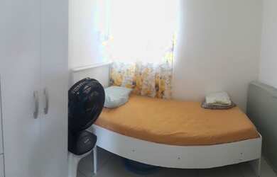 Imagem: A casa possui 2 Dormitórios e 3 Vagas na garagem e está localizado