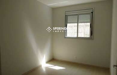 Imagem: O apartamento possui 2 Dormitórios, 1 Banheiro, 2 Vagas na