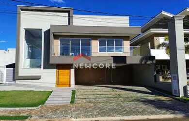 Imagem: A casa possui 5 Dormitórios, 5 Banheiros, 3 Vagas na garagem