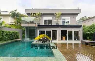 Imagem: A casa em condomínio possui 4 Dormitórios, 5 Banheiros, 4