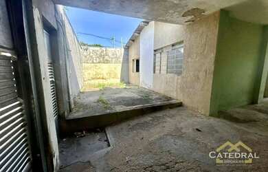 Imagem: A casa possui 3 Dormitórios, 3 Banheiros, 3 Vagas na garagem