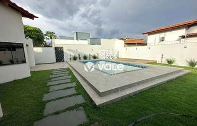 Imagem: A casa possui 4 Dormitórios, 5 Banheiros, 5 Vagas na garagem