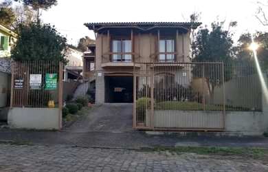 Imagem: A casa possui 3 Dormitórios, 3 Banheiros, 1 Vaga na garagem