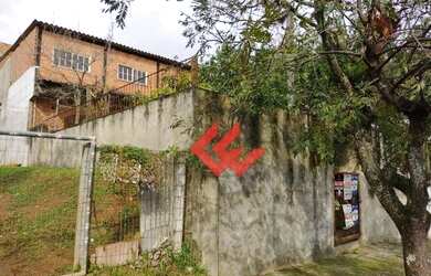 Imagem: A casa possui 3 Dormitórios, 2 Banheiros, 3 Vagas na garagem