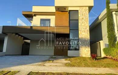 Imagem: A casa possui 3 Dormitórios, 4 Banheiros, 4 Vagas na garagem