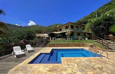 Imagem: A casa em condomínio à venda possui 4 Dormitórios, 4 Banheiros