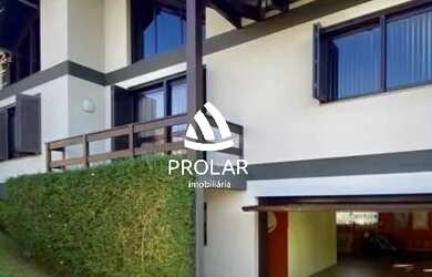 Imagem: A casa possui 4 Dormitórios, 1 Banheiro, 4 Vagas na garagem