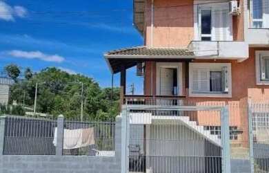 Imagem: A casa possui 2 Dormitórios, 1 Banheiro, 2 Vagas na garagem