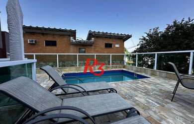 Imagem: A casa possui 3 Dormitórios, 5 Banheiros, 2 Vagas na garagem