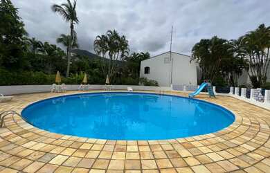 Imagem: A casa em condomínio possui 3 Dormitórios, 2 Banheiros, 2