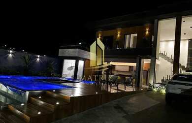 Imagem: A casa em condomínio possui 5 Dormitórios, 5 Banheiros, 254m²