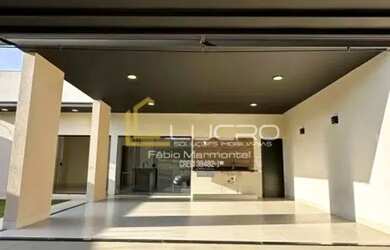 Imagem: A casa possui 3 Dormitórios, 2 Banheiros, 2 Vagas na garagem