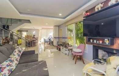 Imagem: A casa possui 3 Dormitórios, 3 Banheiros, 2 Vagas na garagem