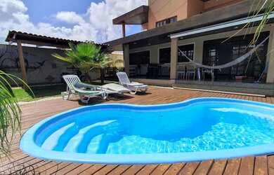 Imagem: A casa possui 5 Dormitórios, 1 Banheiro, 3 Vagas na garagem