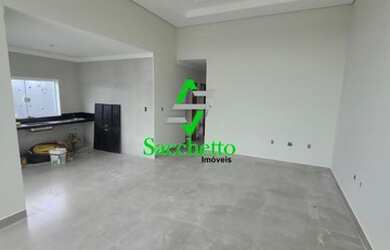 Imagem: A casa possui 3 Dormitórios, 1 Banheiro, 2 Vagas na garagem