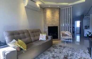 Imagem: A casa possui 3 Dormitórios, 3 Banheiros, 3 Vagas na garagem