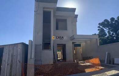 Imagem: A casa possui 3 Dormitórios, 2 Banheiros, 1 Vaga na garagem