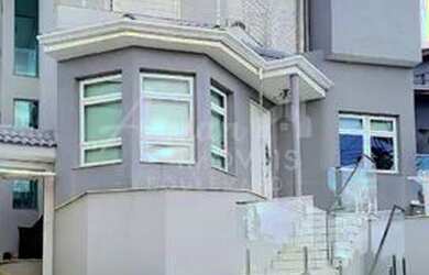 Imagem: A casa em condomínio possui 4 Dormitórios, 4 Banheiros, 5