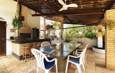 Imagem: A casa possui 5 Dormitórios, 5 Banheiros, 5 Vagas na garagem