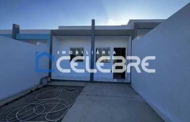 Imagem: A casa possui 2 Dormitórios, 1 Banheiro, 2 Vagas na garagem