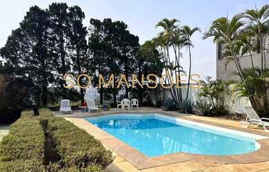 Imagem: A casa em condomínio possui 4 Dormitórios, 5 Banheiros, 5