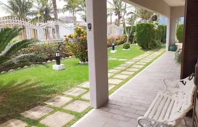 Imagem: A casa possui 5 Dormitórios, 5 Banheiros, 5 Vagas na garagem