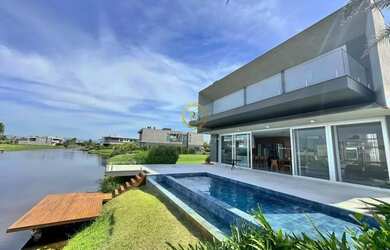 Imagem: A casa em condomínio possui 5 Dormitórios, 5 Banheiros, 2